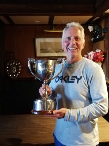 Photo of Mark Pressdee holding the Lee cup